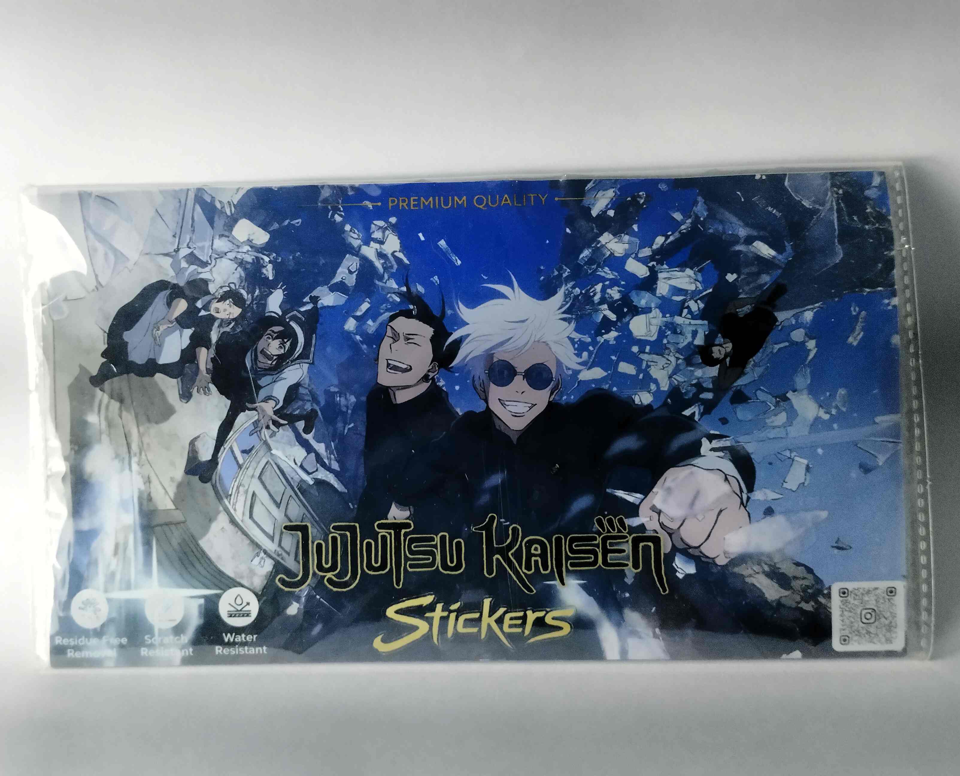Pack of Jujutsu Kaisen stickers with anime characters on a blue and black background.